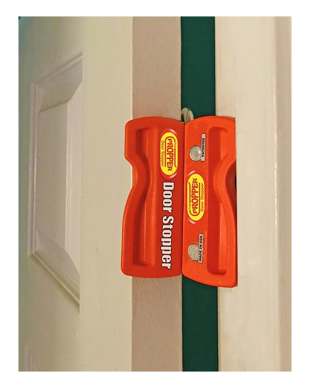 Magnetic fold-up door stopper design detail